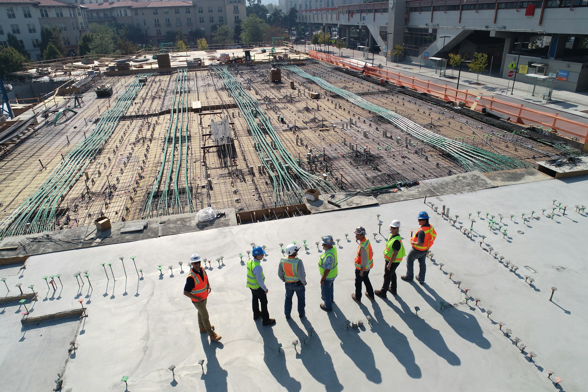 Organised construction site with structural steel framework